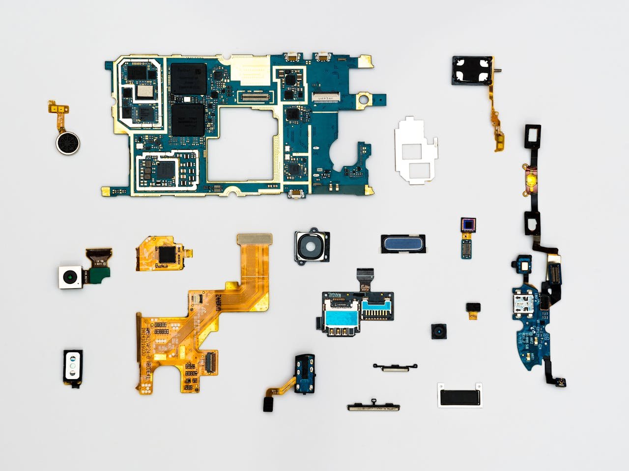 ours-journey Exploded view of smartphone components showcasing intricate technological design.