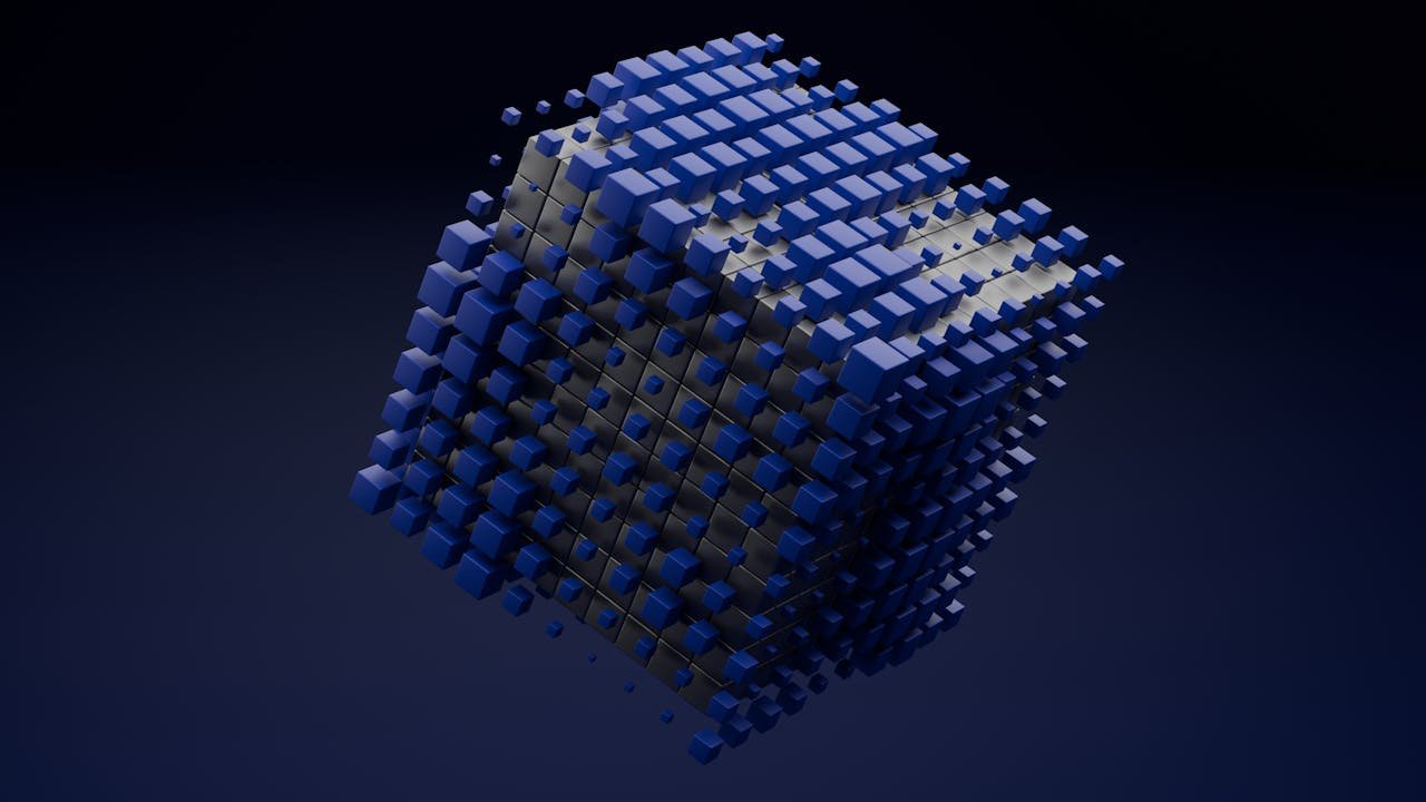 about-02 A 3D abstract cube made of blue blocks floating on a dark background.